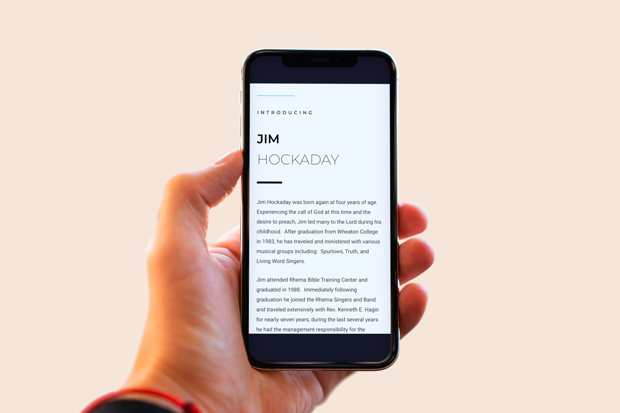 Cell phone mockup featuring the biography for Jim Hockaday